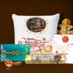 Personalized Rakhi gift for brother with photo cushion, Om rakhi, Ferrero Rocher chocolates and greeting card for brother.