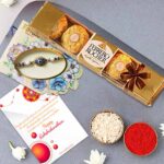 Chocolate Rakhi Gift for Brother with evil eye rakhi, Ferrero Rocher chocolates, greeting card and roli chawal